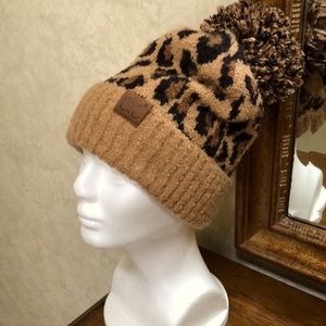 New Women’s CC leopard hat with Pom.  Fold up edge.  Soft.  Black and brown.
